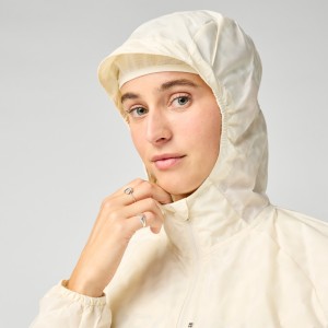 Kurtka do biegania damska odblaskowa Canopy Reflective Jacket jasnokremowa